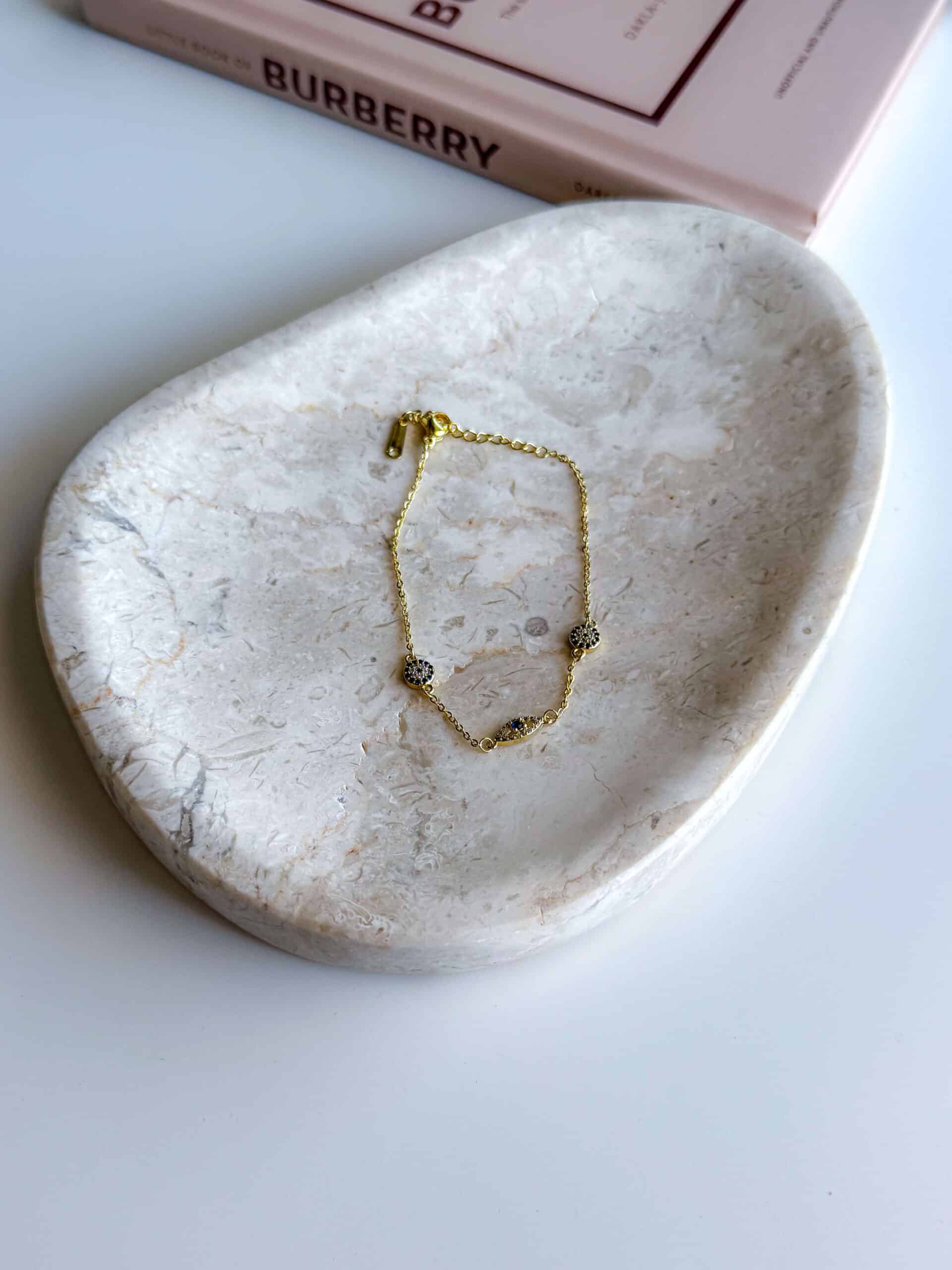 γυναικεία χρυσή αλυσίδα χεριού με ματάκι