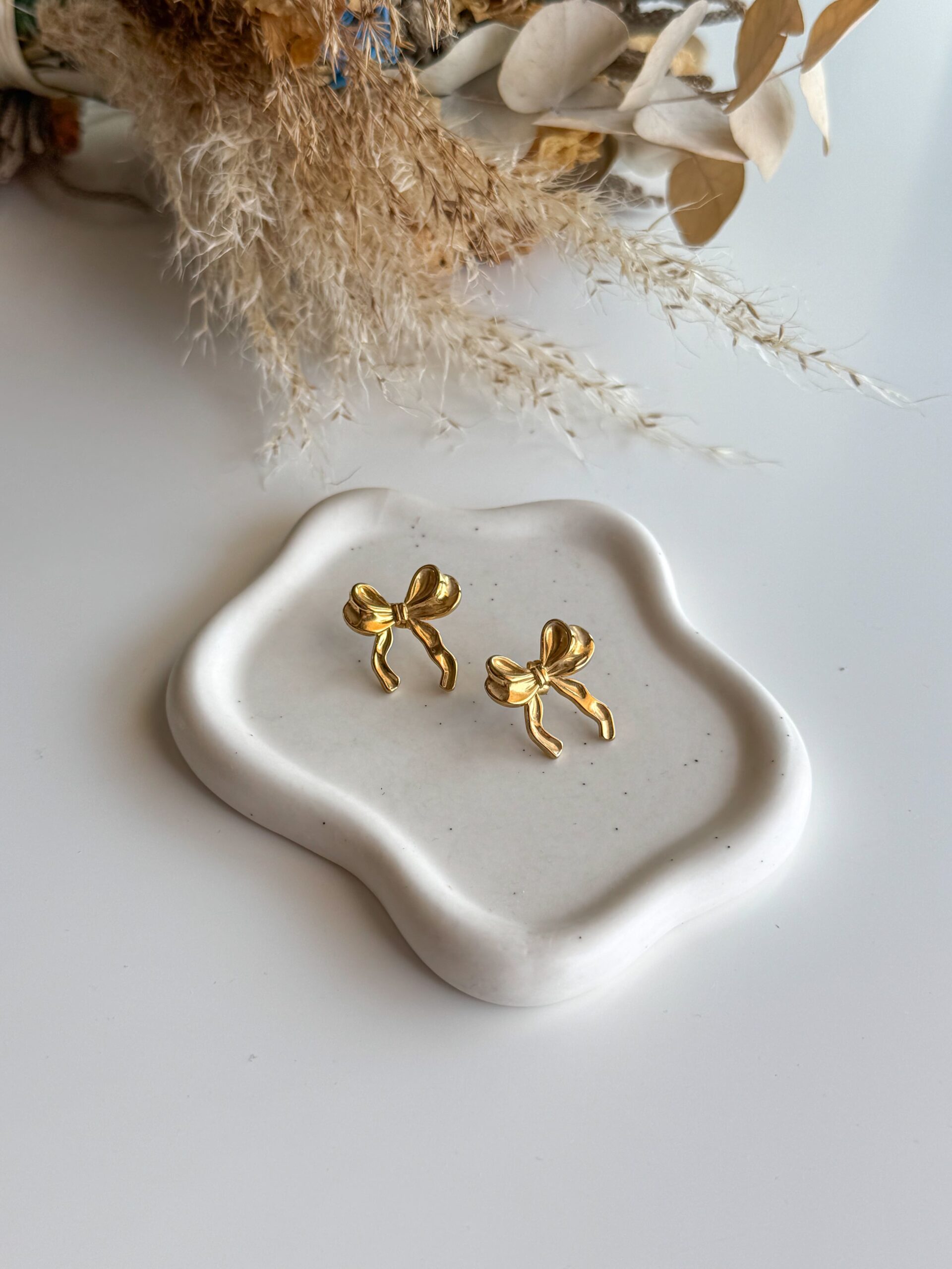 Χρυσά σκουλαρίκια φιογκάκια